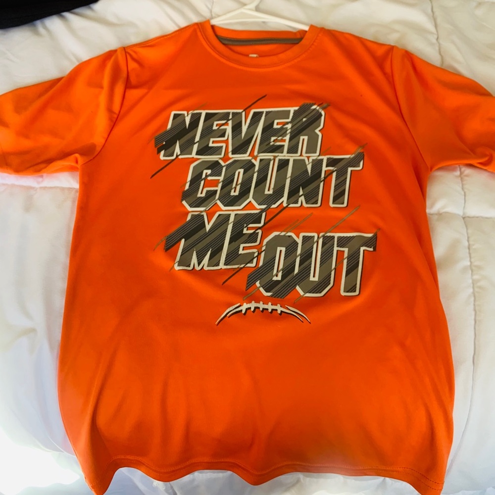 A slightly used Just Do It T Shirt